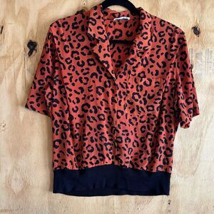 Vintage Kelly Scott Orange Animal Print Short Sleeve Banded Hem Blouse